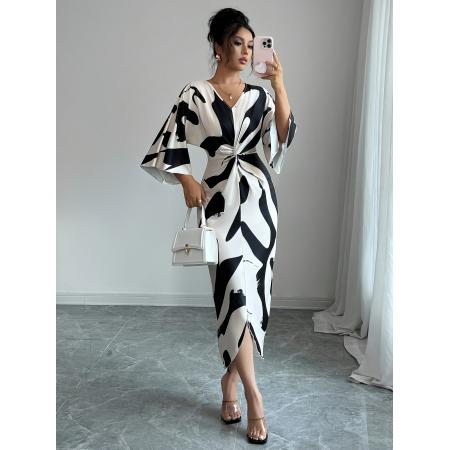 女士杏色底色印花针织V领收腰扭...