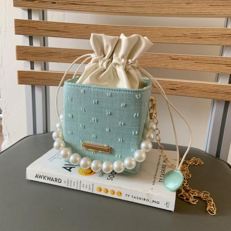 TJ2055# 夏天纯色2025新款个性抽带洋气休闲感简约珍珠斜挎手提水桶女包