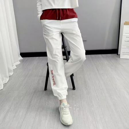 YF6922# (2色入内）韩版时尚松紧腰绑绳束腿字母印花二色拼接运动休闲裤